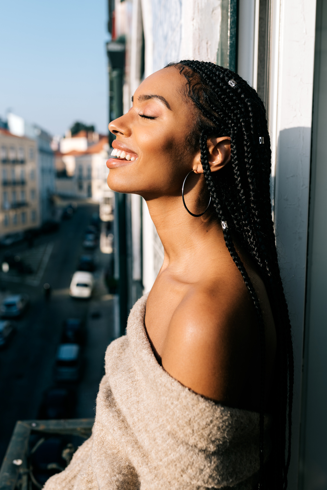 A smiling woman looking at the camera.
